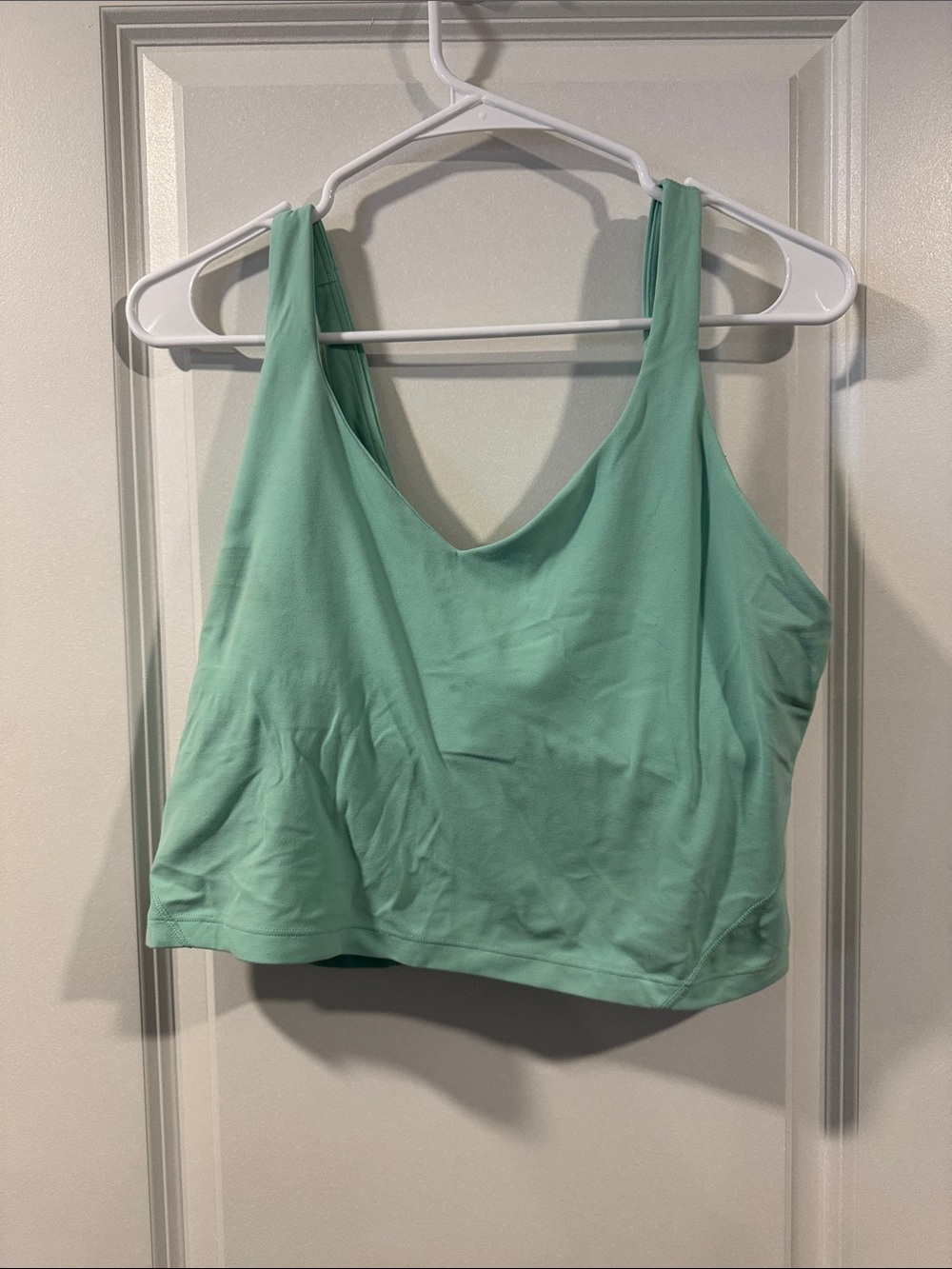 lululemon mint green cropped workout tank with reflective logo
